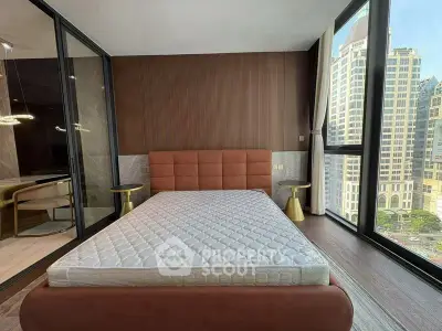 Luxurious bedroom with city view and modern decor in high-rise apartment