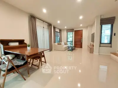 Spacious modern living room with elegant decor and natural light