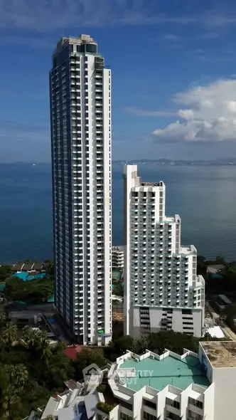 Stunning high-rise buildings with ocean view, perfect for luxury living.