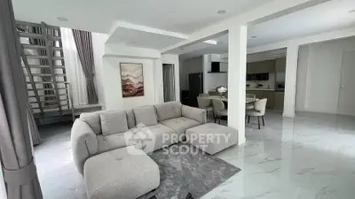 Spacious modern living room with open layout and elegant decor
