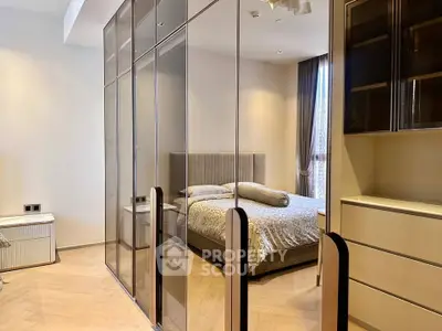 Luxurious bedroom with glass wardrobe and elegant decor