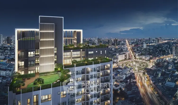 Stunning rooftop garden on modern high-rise with panoramic city views at night.