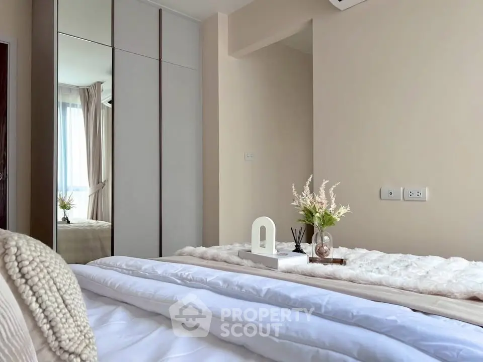 Elegant bedroom with cozy bedding and stylish decor