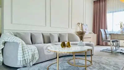 Elegant living room with modern decor and cozy seating area