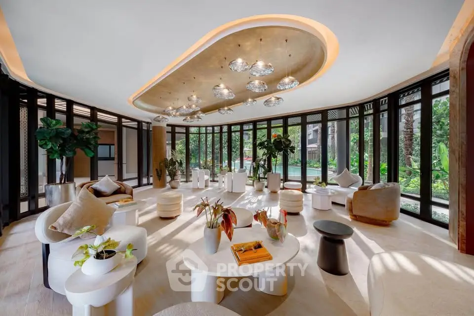 Luxurious modern living room with elegant decor and panoramic garden views.