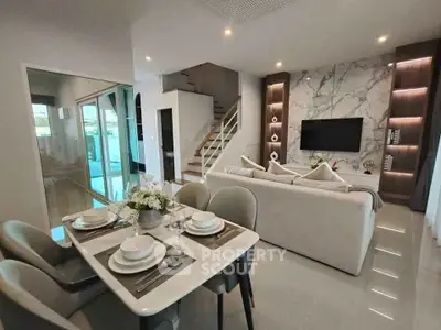 Luxurious modern living room with elegant dining area and stylish decor