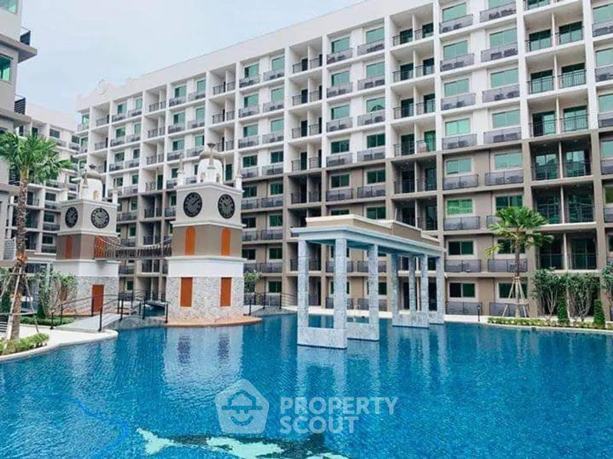 Luxurious condominium with stunning pool and modern architecture.