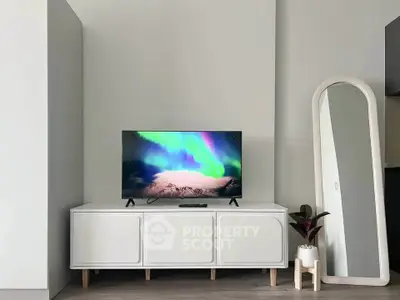 Modern living room with sleek TV stand and stylish decor