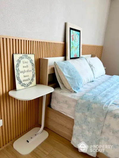 Cozy bedroom with stylish decor and modern wooden paneling