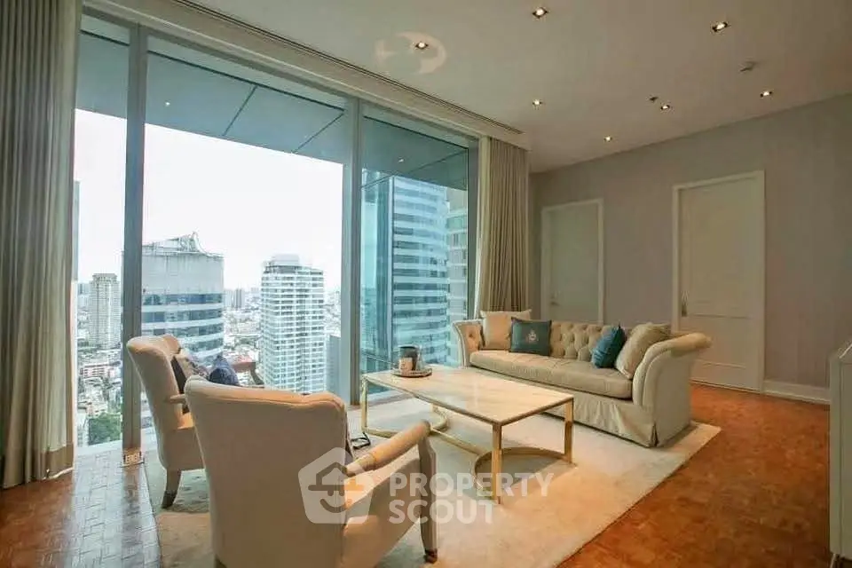 Luxurious living room with stunning city view in high-rise apartment