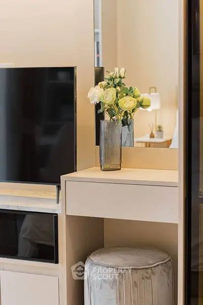 Modern living room with stylish TV setup and elegant decor