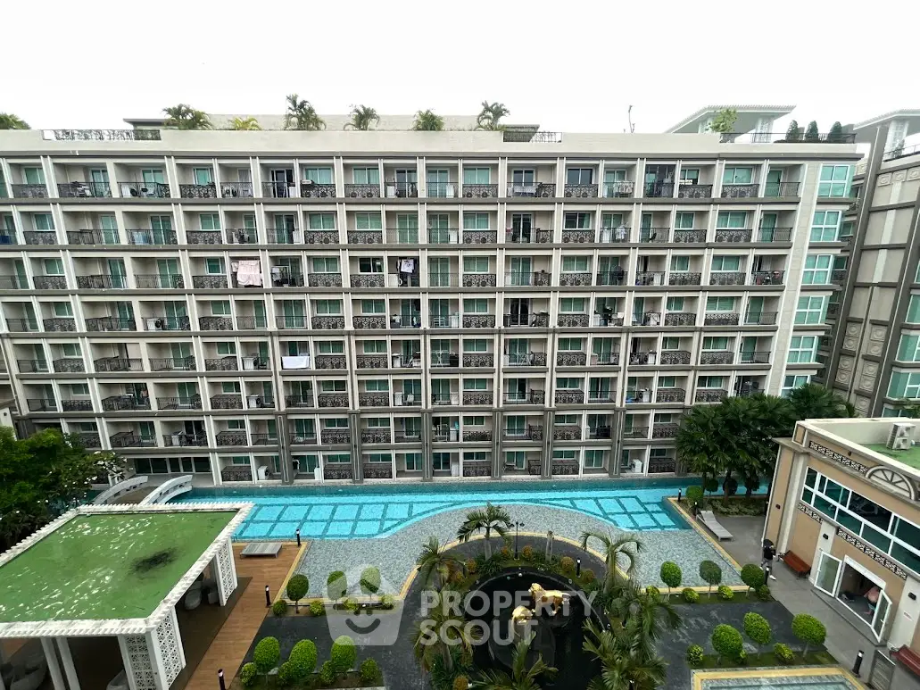 Luxurious apartment building with pool and garden view