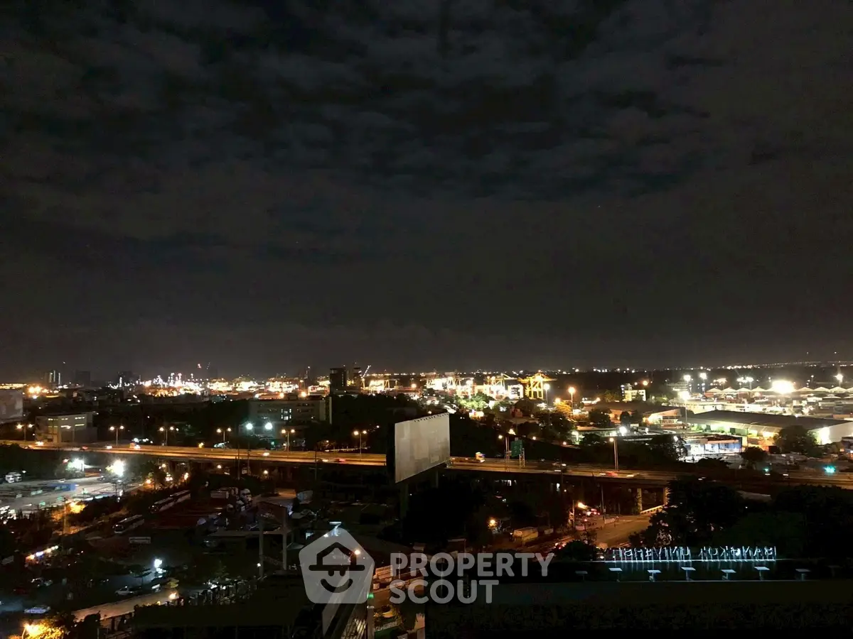 Stunning cityscape night view with illuminated skyline and vibrant lights, perfect for urban living enthusiasts.