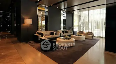 Luxurious modern living room with elegant decor and ample natural light