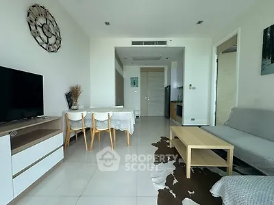 Modern living room with stylish decor and open layout in a contemporary apartment.