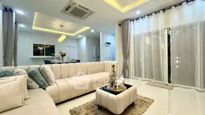 Luxurious living room with elegant decor and ambient lighting