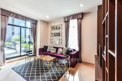 Elegant living room with large window and stylish decor