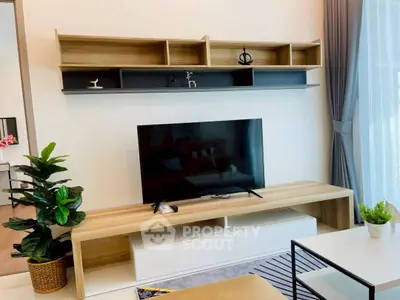 Modern living room with stylish TV unit and elegant decor