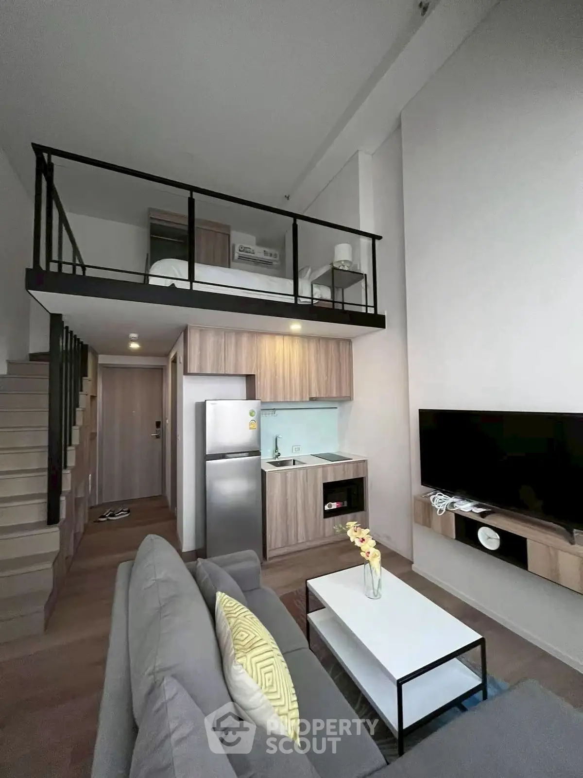 Modern loft apartment with mezzanine bedroom and stylish living area