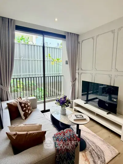 Chic modern living room with stylish decor and large window view