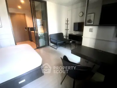 Modern studio apartment with sleek furnishings and open layout, ideal for urban living.