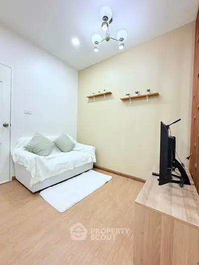 Cozy living room with modern decor and wooden flooring