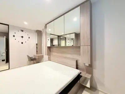 Modern bedroom with sleek built-in storage and minimalist design