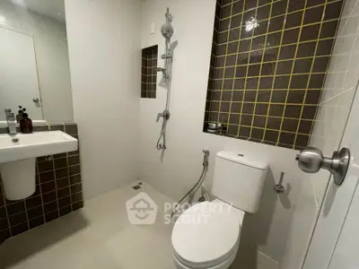 Modern bathroom with sleek fixtures and stylish tile design