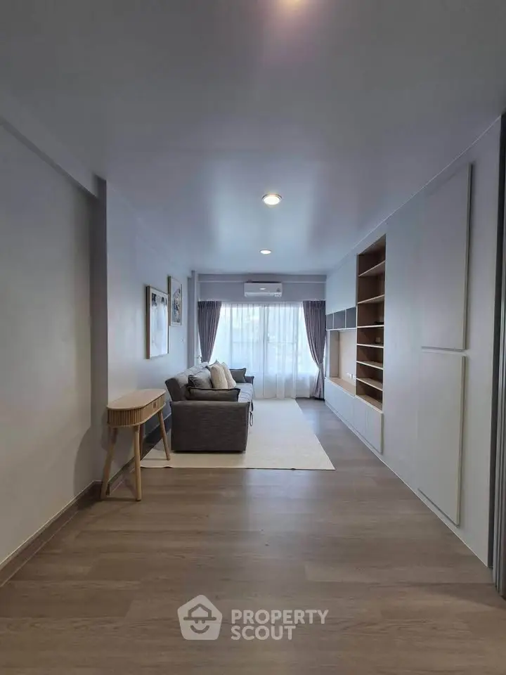 Spacious modern living room with stylish furniture and ample natural light