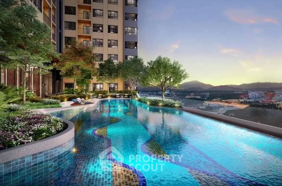 Luxurious rooftop pool with stunning cityscape and mountain views at sunset.