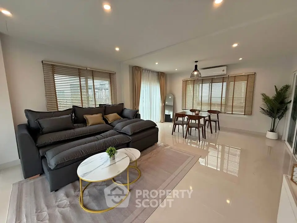 Spacious modern living room with elegant decor and natural light
