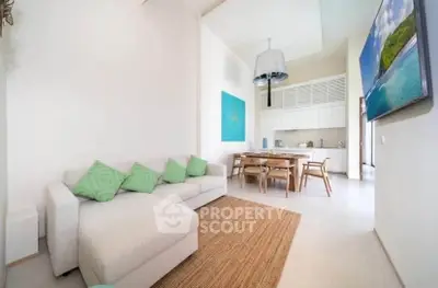 Spacious modern living room with open kitchen and stylish decor