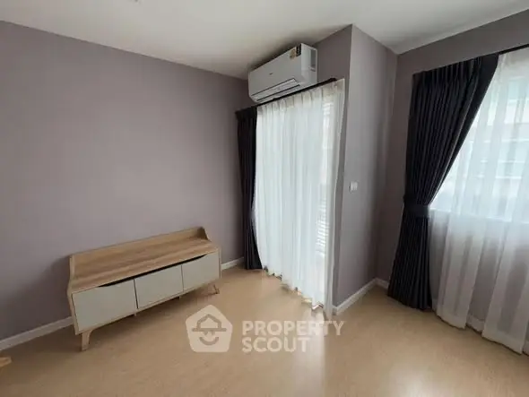 Modern minimalist room with air conditioning and natural light