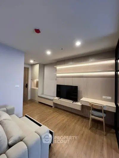 Modern living room with sleek design and cozy ambiance