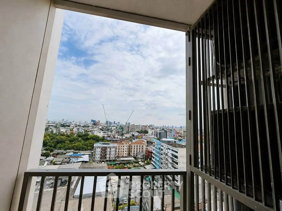 Stunning cityscape view from a high-rise balcony, perfect for urban living enthusiasts.