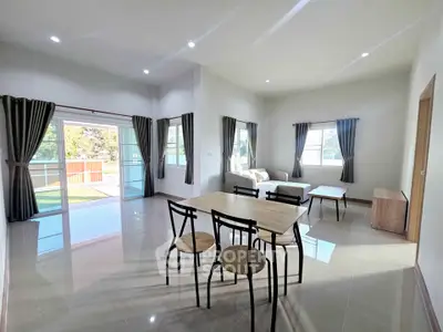 Spacious modern living room with open layout and natural light
