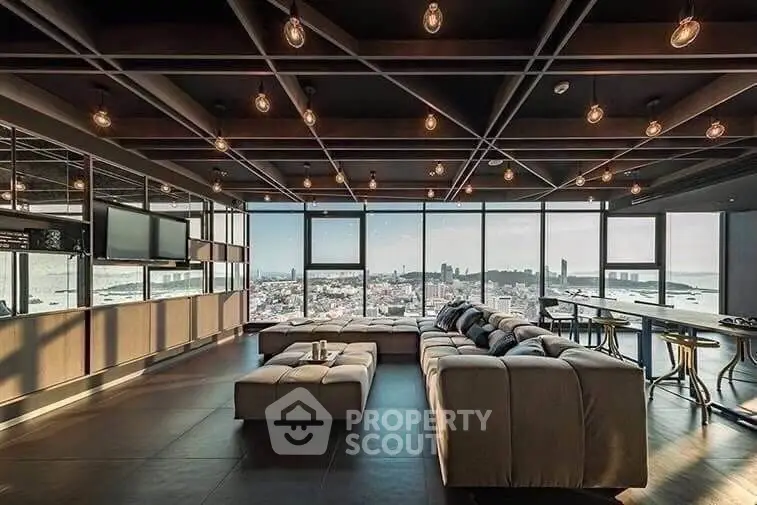 Luxurious modern living room with panoramic city view and stylish lighting.