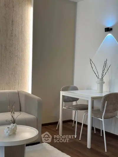 Modern living room with elegant dining area and stylish decor