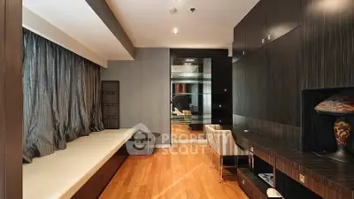 Luxurious modern living room with elegant wood flooring and stylish decor