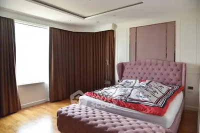 Luxurious bedroom with elegant decor and plush furnishings