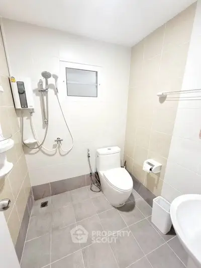 Modern bathroom with shower and toilet in minimalist design