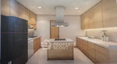 Modern kitchen with island, sleek cabinetry, and integrated appliances in a stylish home.