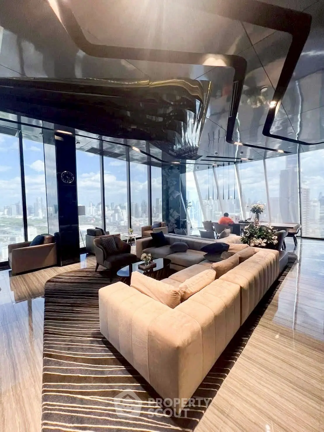 Luxurious living room with panoramic city views and modern design