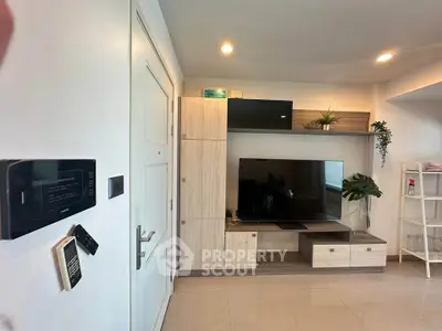 Modern living room with sleek TV unit and stylish decor