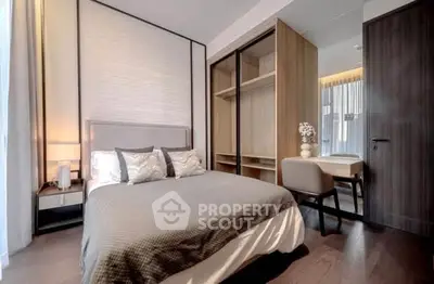 Modern bedroom with stylish decor and ample natural light