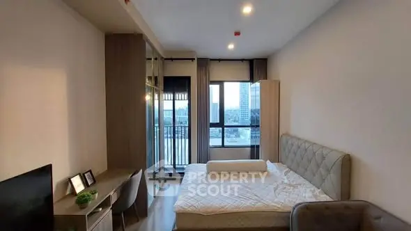 Modern bedroom with city view and stylish decor