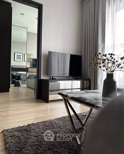 Modern living room with sleek TV stand and stylish decor