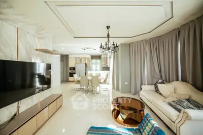 Luxurious modern living room with elegant decor and open kitchen layout