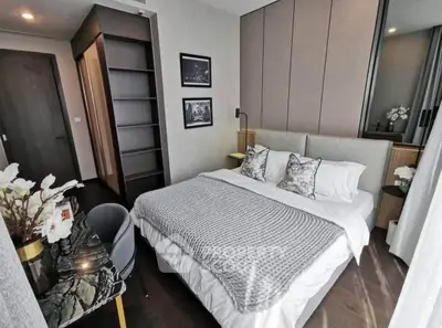 Modern bedroom with stylish decor and cozy ambiance