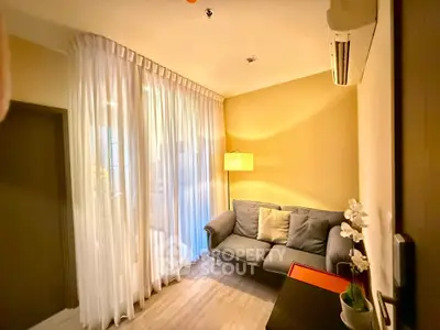 Cozy living room with modern decor and natural light